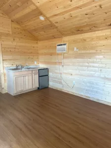 room with a sink and trash area - Phoenix take down park model home